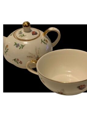 Conservatory by Skye McGhie Tiny Floral & Ivory Porcelain teapot and a teacup